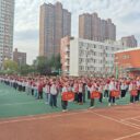 书香袅袅润童心　阅读向未来 ——武汉为明学校小学部举行第九周升旗仪式